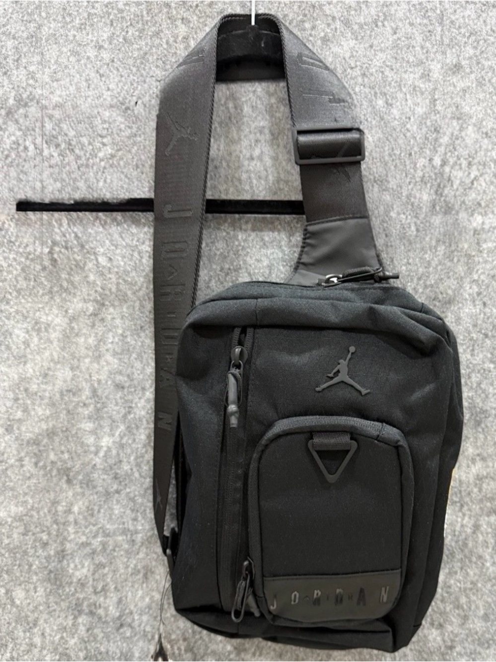 Jordan Black Sling Bag with Embossed Strap
